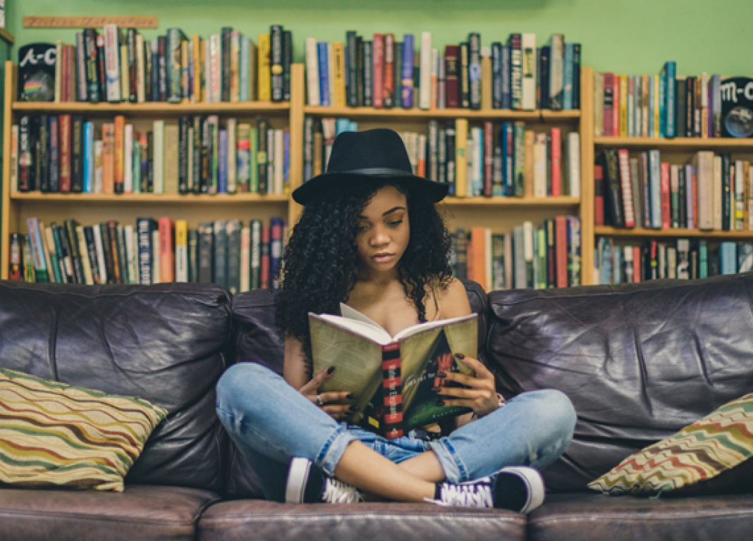 Young woman reading a book 