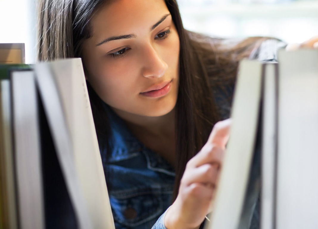 Woman Between Books 